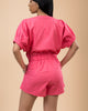 Linen Pink Romper with Button Front Elastic Waist, V-neck, Elastic Cuffs, and Short Dolman Sleeves